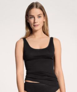 jente i svart bomull singlet fra calida