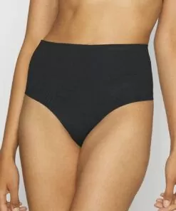 jente i svart shaping hold-in high waist stringtruse