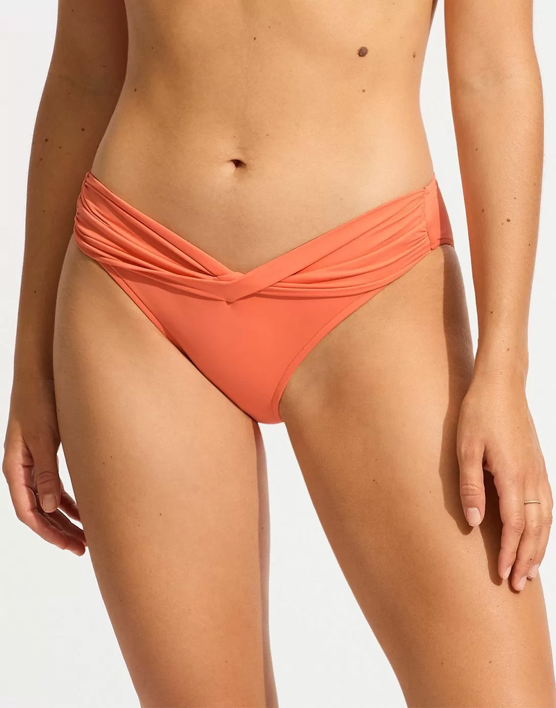Orange bikiniunderdel på underkropp Seafolly