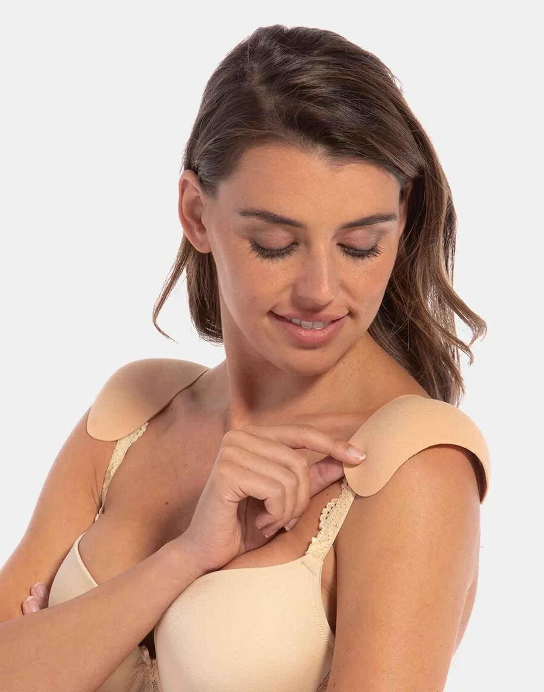 skulderputer i beige