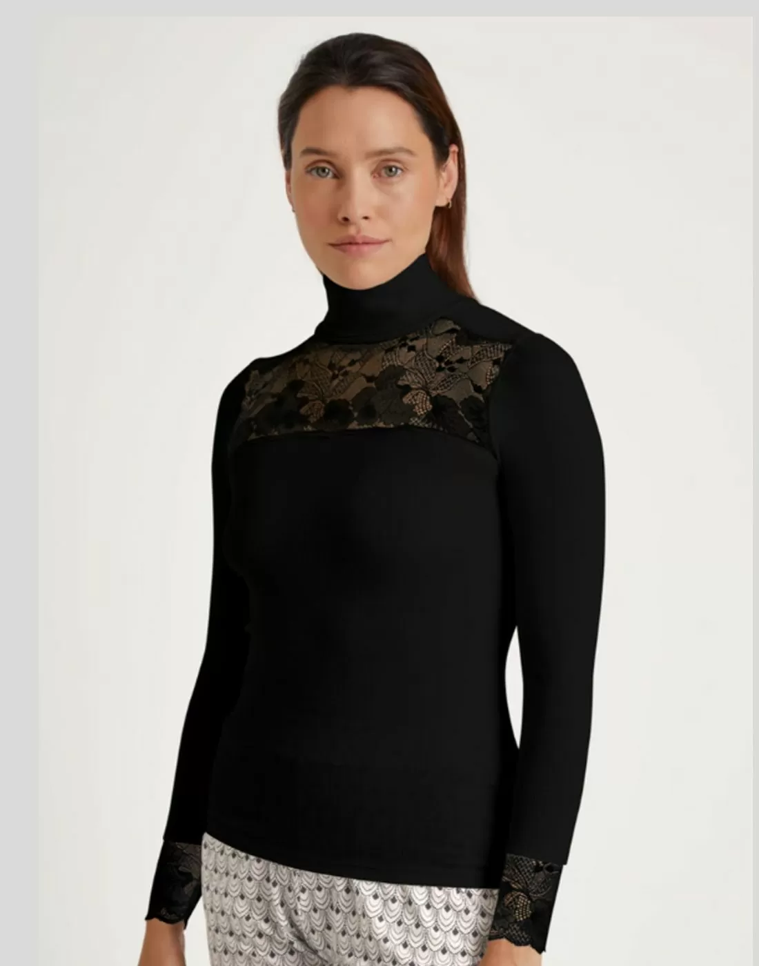 calida silky wool glam ullgenser svart blonder